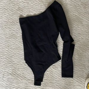 Kittenish one shoulder body suit